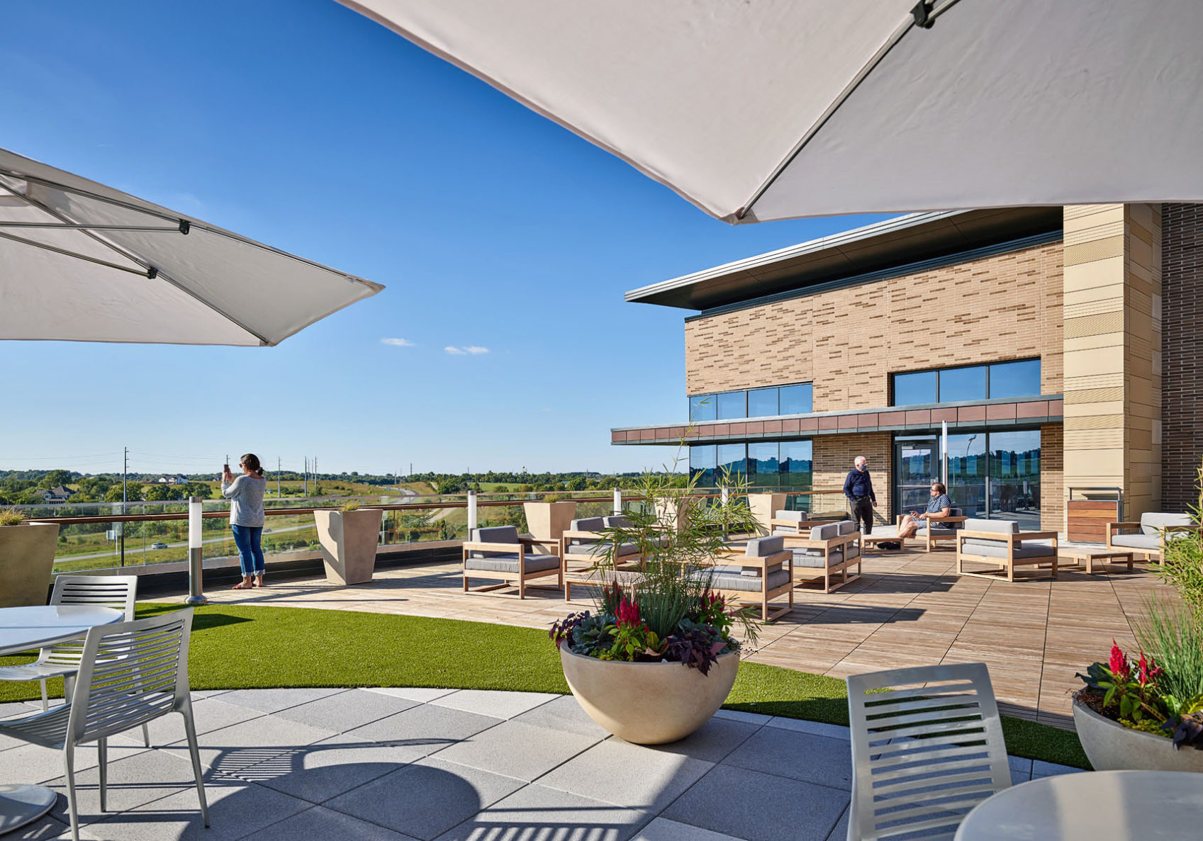 People enjoying the new rooftop seating at LMH Health West
