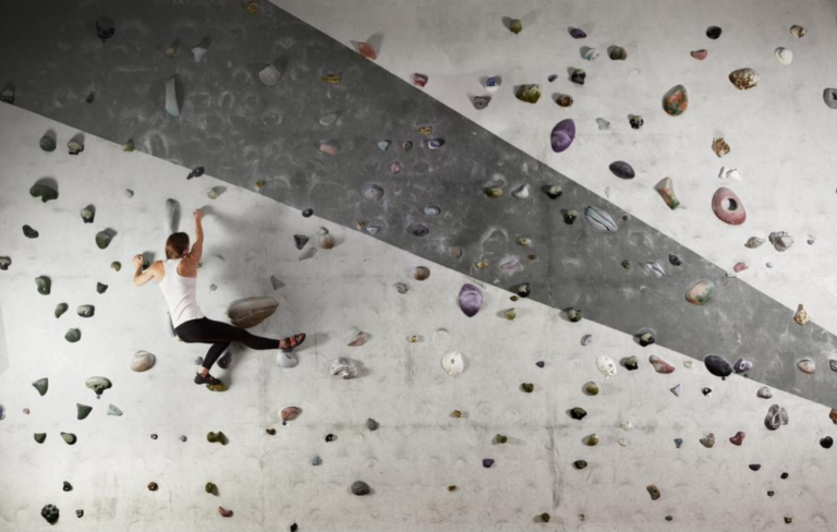 A women on a climbing wall