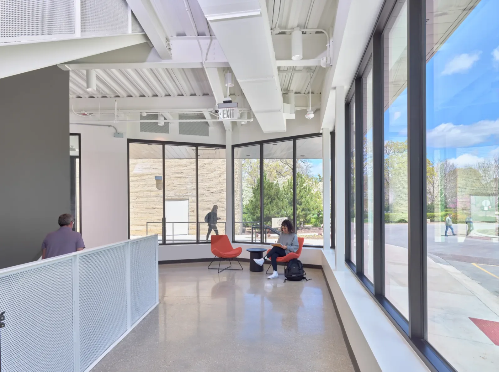 A long hallway with seating at the KSU Morris Family Multicultural Center