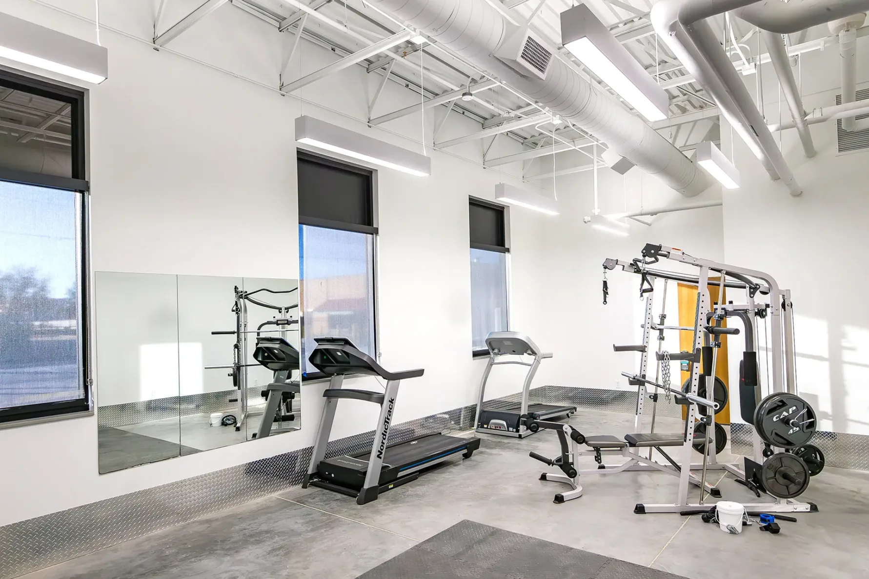 A gym with fitness equipment for officers to use at the Great Bend Justice Center