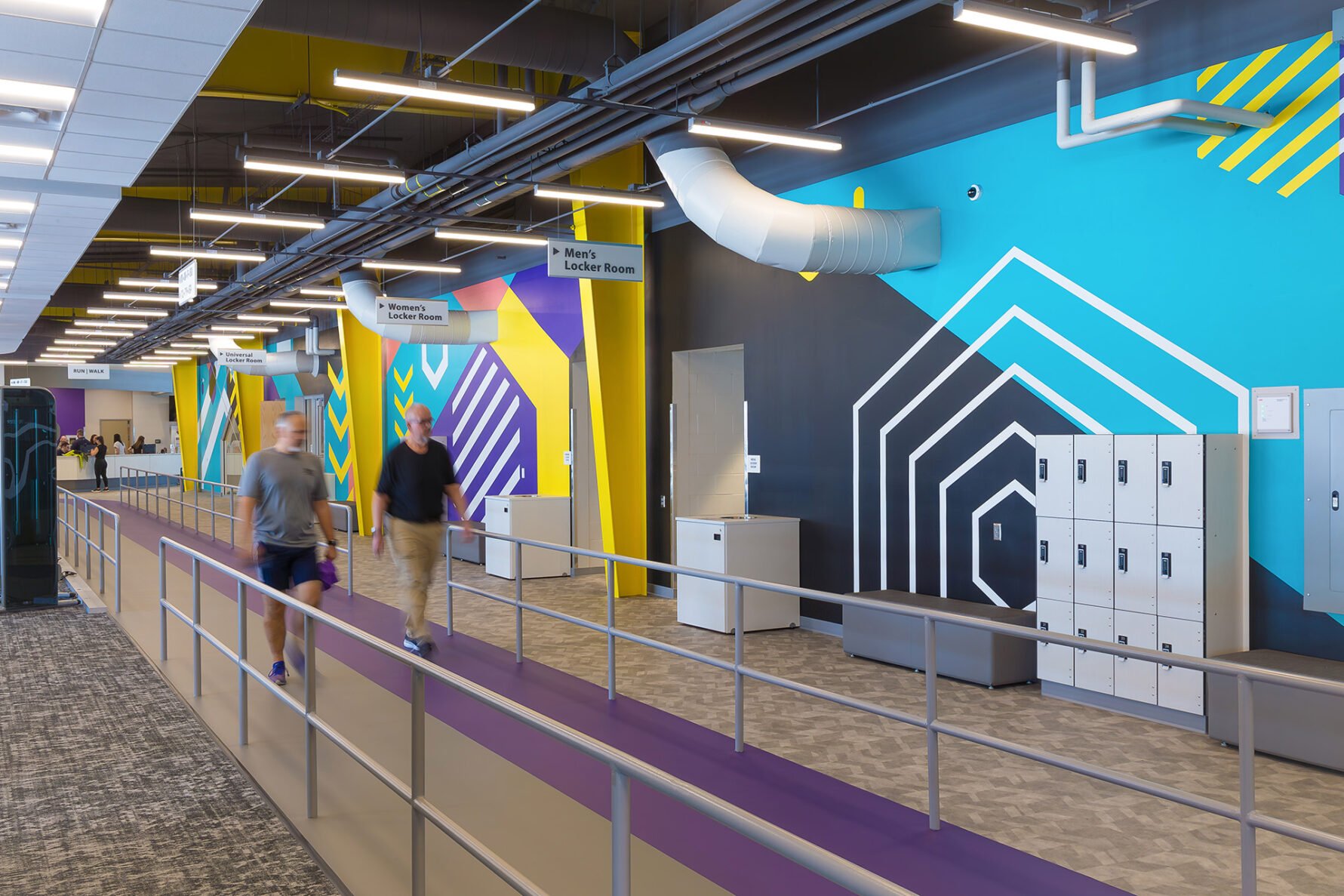 Two people walking on the indoor track at Valley Center Rec Center